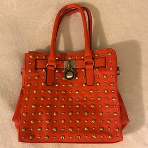 Orange faux leather bag with gold studs/padlock